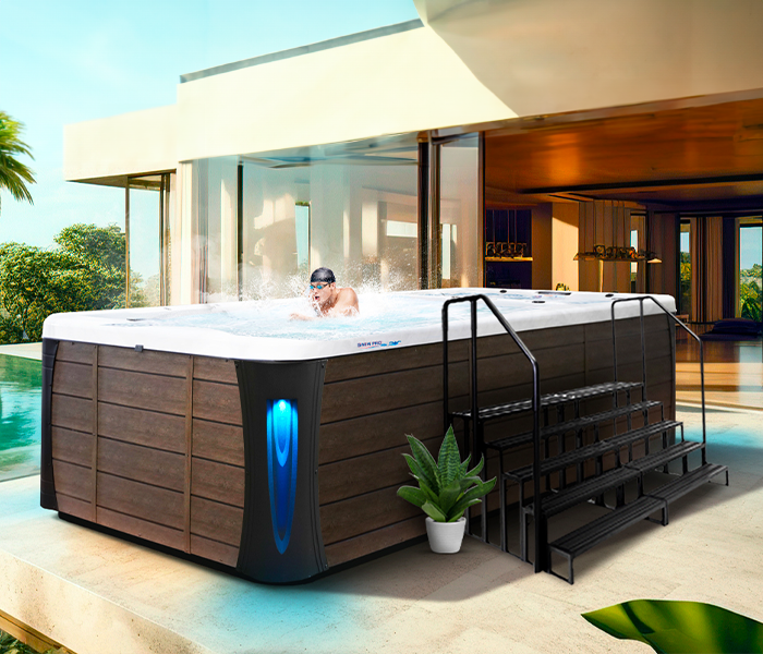 Calspas hot tub being used in a family setting - Springdale